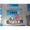Image 1 : Bag of assorted world coins and paper bank notes