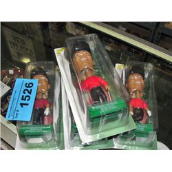 4 tiger woods bobble heads