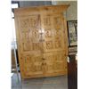 Image 1 : Approx 8F tall solid wood 4 door with iron accents