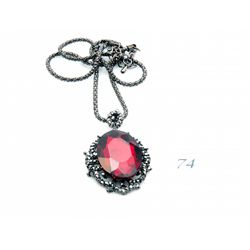 Ladies costume jeweled red stone pendant and