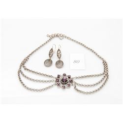 Ladies costume jeweled necklace with purple stone