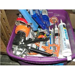 Plastic tote of caulking guns and tubes