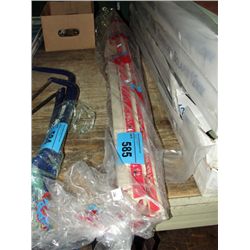 Bag of extra wide track strip carpet laying board