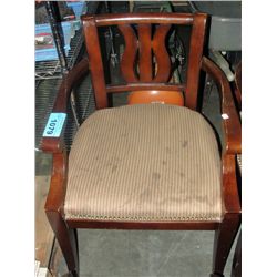 Dark stained oak arm chair