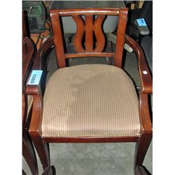 Dark stained oak arm chair