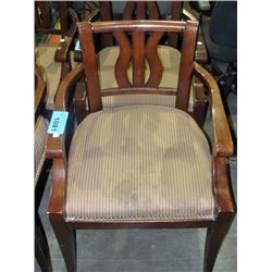 Dark stained oak arm chair