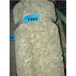 Small white shag area rug