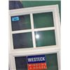 White vinyl framed double pane window