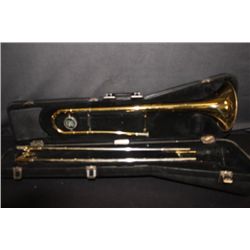 KING TROMBONE WITH ORIGINAL CASE AND MINOR DENTS -