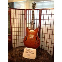 The Ibanez Artcore AS93 is a semi-hollowbody electric