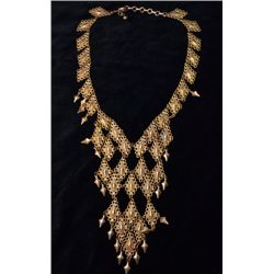 Vintage Gold tone metal (Brass?) Bib style necklace, 16" long, 5" drop in front.