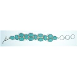 New German Silver Bracelet with Syn Turquoise. 7" long