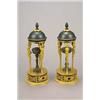 Image 1 : A pair of bronzed and gilt metal brule parfums in Empire style, each cover with a finial and leaf...