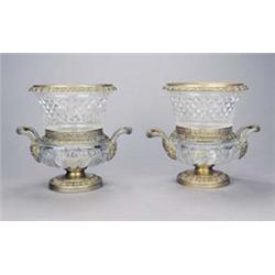 A pair of cut glass and gilt metal campana wine coolers in early 19th century Boulton style, each...