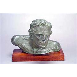 H Orresto, a terracotta bust of Jean Mermoz with green bronzed patination on later rectangular ba...