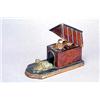 Image 1 : A 19th century amboyna and ebonised box in the form of a kennel, with an embossed gilt metal recu...