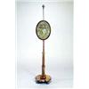 Image 1 : A William IV rosewood pole screen, with a leaf carved finial, an oval woolwork banner on reeded c...