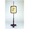 Image 1 : A George IV mahogany pole screen, with a turned finial, the woolwork canted rectangular rosewood...