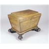 Image 1 : A William IV mahogany sarcophagus shaped cellaret, the hinged top with a concave edge, on taperin...