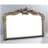 Image 1 : A Victorian gilt overmantel, the serpentine crest with foliate and 'C' scrolls and garlands of fl...