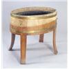 Image 1 : A walnut oval and brass bound wine cooler/jardiniere with a metal liner, and four outswept legs,...