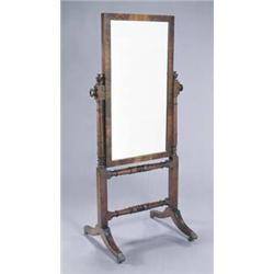 A George IV mahogany cheval mirror, the rectangular plate with a crossbanded frame with turned fi...