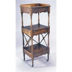 A George IV rosewood three tier whatnot, with a three tier gallery and three drawers with shaped...