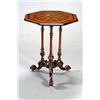 Image 1 : A Victorian walnut octagonal table, the top with a parquetry stylized star and a moulded edge, on...