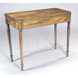 A George IV mahogany tea table, the canted rectangular folding top with reeded edges, on ring tur...
