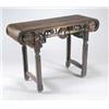 Image 1 : A 19th century Chinese huang huali altar type table, the rectangular top of cleated form with scr...