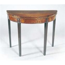 A George III mahogany demi lune card table, the hinged top enclosing a later leather inset on mou...