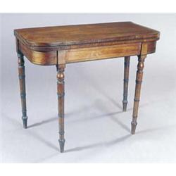 A George IV mahogany and ebony strung card table, the rectangular top with rounded corners foldin...