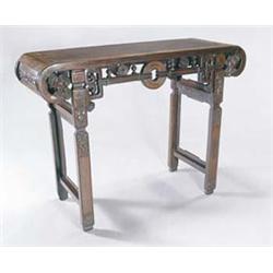A 19th century Chinese huang huali rectangular altar type table, the top of cleated form with scr...