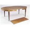 Image 1 : A French satinwood and tulipwood crossbanded extending dining table with two loose leaves, with b...