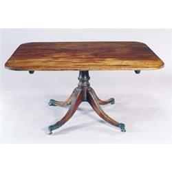 A George IV mahogany breakfast table, the rectangular top with rounded corners and a reeded edge,...