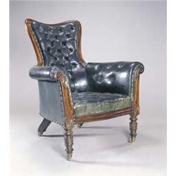 A William IV rosewood showframe armchair with leather upholstered back, seat and sides, acanthus...