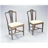 Image 1 : A set of six late George III mahogany dining chairs each with a serpentine crest, later carved wi...