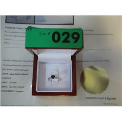 Genuine .67 carat black dimoand ring.