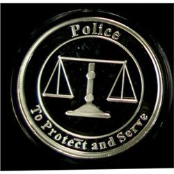 "SALUTE TO POLICE OFFICERS" ON A ONE OUNCE .999 SILVER ART ROUND,  CAPSULE/BOX