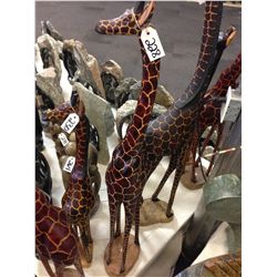 GIRAFFE, HAND CARVED FROM A SINGLE PIECE OF AFRICAN MAHOGANY. 48" TALL