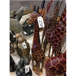 GIRAFFE, HAND CARVED FROM A SINGLE PIECE OF AFRICAN MAHOGANY. 36" TALL