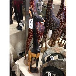 GIRAFFE, HAND CARVED FROM A SINGLE PIECE OF AFRICAN EBONY. 36  TALL