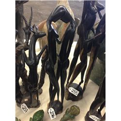 COUPLE, HAND CARVED FROM A SINGLE PIECE OF AFRICAN EBONY. 27  TALL