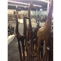 GIRAFFE, CARVED FROM A SINGLE PIECE OF AFRICAN MAHOGANY, 87" TALL