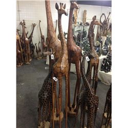 GIRAFFE, CARVED FROM A SINGLE PIECE OF AFRICAN MAHOGANY, 82" TALL