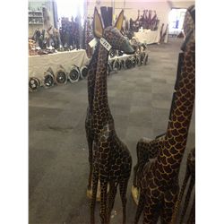 GIRAFFE, CARVED FROM A SINGLE PIECE OF AFRICAN MAHOGANY, 74" TALL