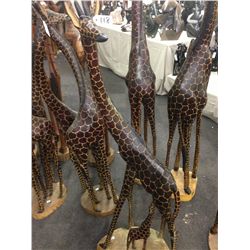 GIRAFFE PAIR, CARVED FROM A SINGLE PIECE OF AFRICAN MAHOGANY, 60" TALL