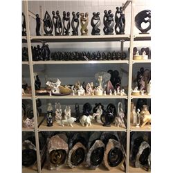 5 SHELVES OF ASSORTED STONE CARVINGS, AND OTHER COLLECTABLES. HUNDREDS OF DOLLARS IN RETAIL VALUE