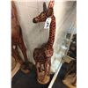 Image 1 : GIRAFFE PAIR, CARVED FROM A SINGLE PIECE OF AFRICAN MAHOGANY, 48" TALL
