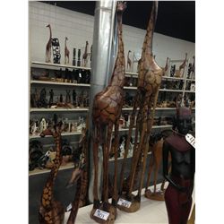 GIRAFFE, CARVED FROM A SINGLE PIECE OF AFRICAN MAHOGANY, 60" TALL